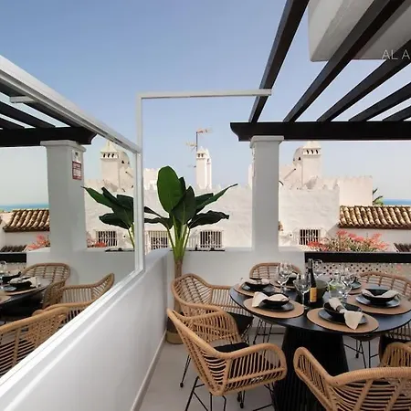 Scandinavian Seaside Retreat: Calahonda Beachfront Apartment Sitio de Calahonda